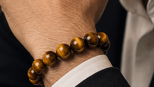 Golden Tiger Eye bracelet worn on the wrist with a dark sleeve