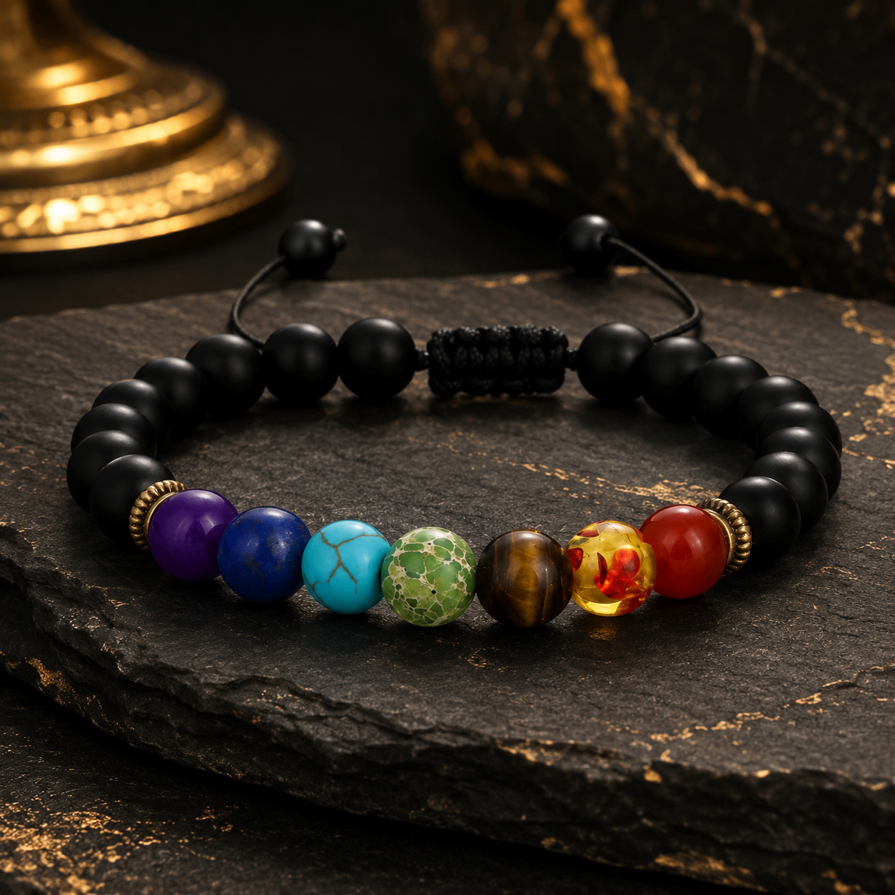 Matte Black Stone Color Accent Bracelet styled on dark stone surface