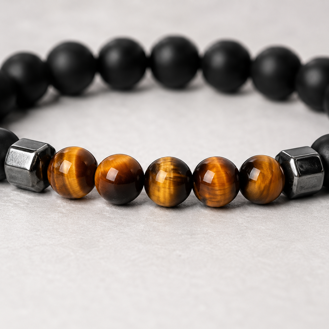 Tiger Eye & Matte Black Silver-Tone Bracelet bead and silver accent detail
