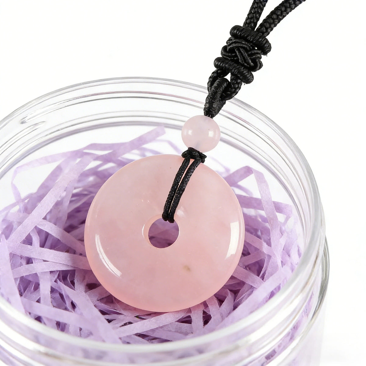 Rose Quartz Circle Pendant Necklace — stone and surface detail