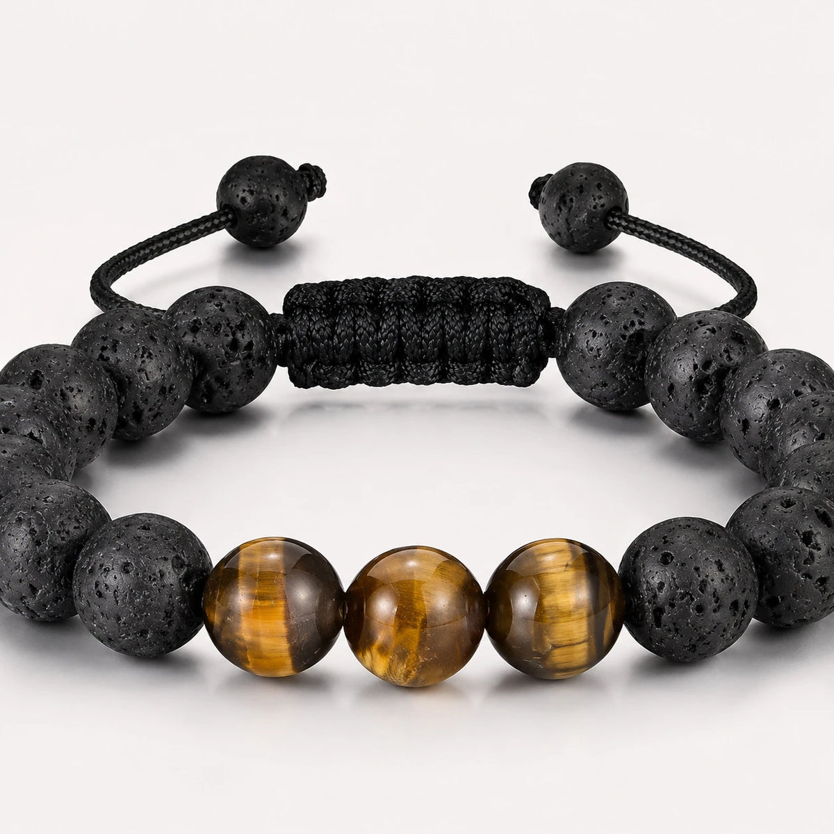 Lava Stone & Tiger Eye Bracelet — stone and surface detail